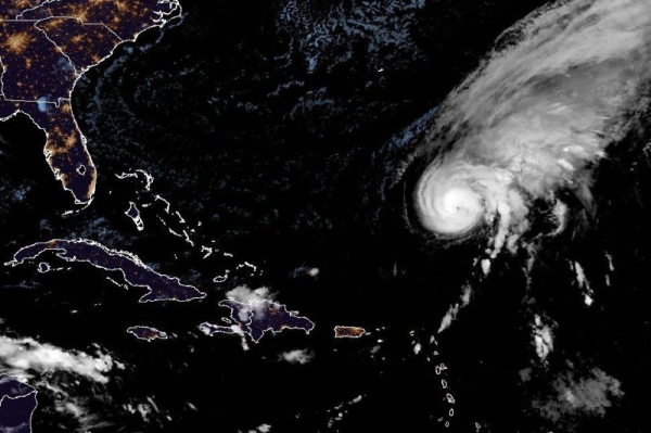Hurricane Tammy continues to strengthen far from from land