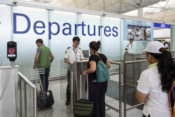 Republican state senator arrested at Hong Kong airport for gun in carry-on