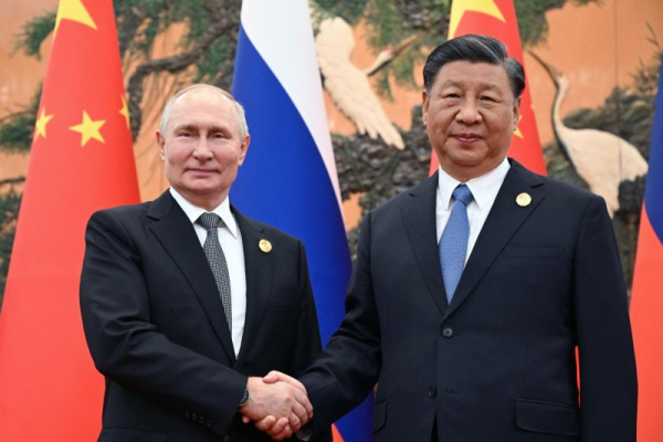 Xi, Putin present united front at Beijing conference promoting China's Belt and Road initiative Xi, Putin present united front at Beijing conference promoting China's Belt and Road initiative