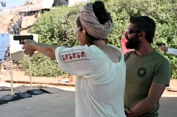 Israelis, women increasingly arming themselves in wake of Hamas attack