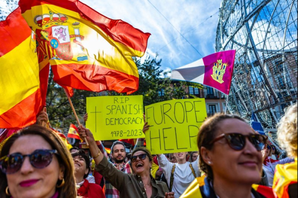 Tens of thousands in Spain protest proposed Catalan amnesty deal