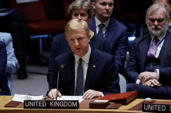 Britain accuses Russia of cyberattacks aimed at democratic processes