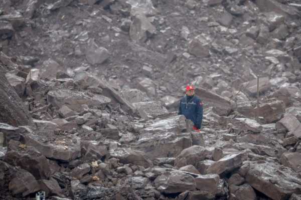 At least 34 dead in China landslide; rescuers still searching for 10 missing