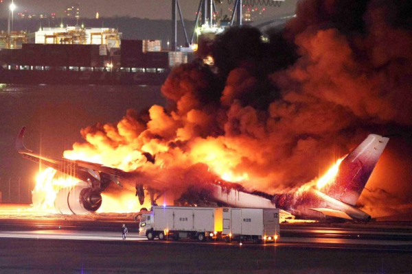 Five killed aboard Japan earthquake relief flight in fiery collision with JAL jet liner