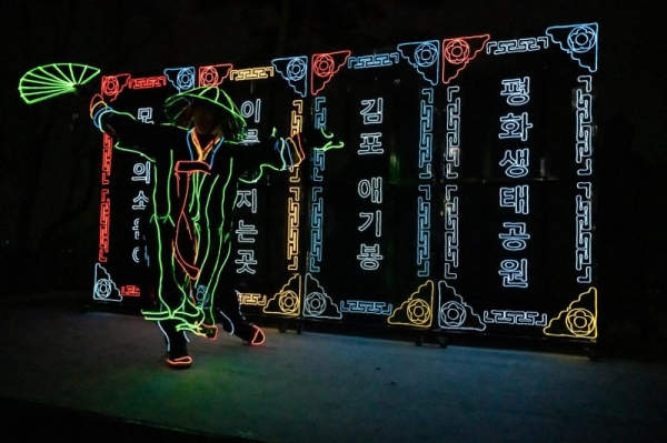 Across the river from North Korea, a laser light show for peace