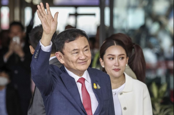 Former Thai Prime Minister Thaksin Shinawatra to be paroled from prison Former Thai Prime Minister Thaksin Shinawatra to be paroled from prison