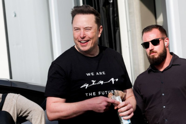 Elon Musk visits German Tesla plant as it reopens after suspected arson