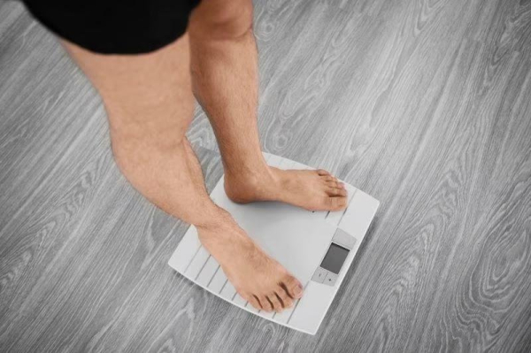 Competing for cash may spur men to lose weight
