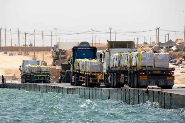 U.S. military's Gaza pier aid operation resumes after relocation due to storms