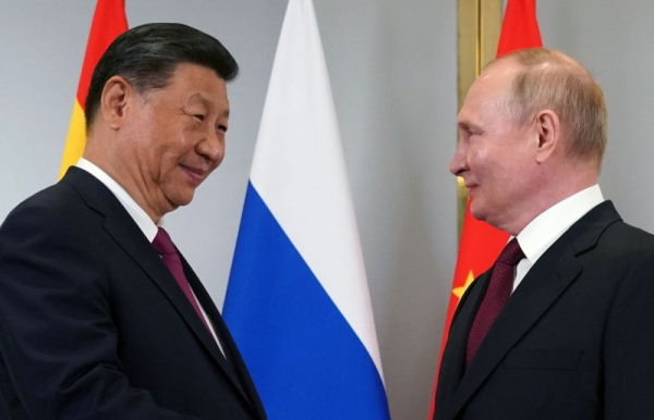 Putin, Xi meet for second time in as many months on sideline of Eurasian summit