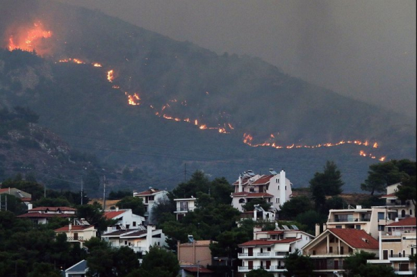 Greek capital on high alert as forest fire flames as high as 80 feet approach Athens