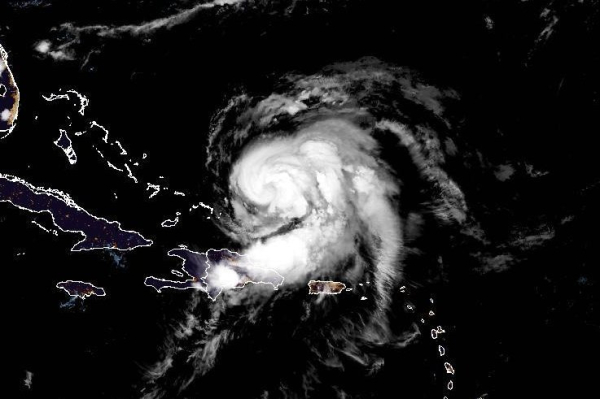 Hurricane Ernesto gathers strength as it aims for Bermuda
