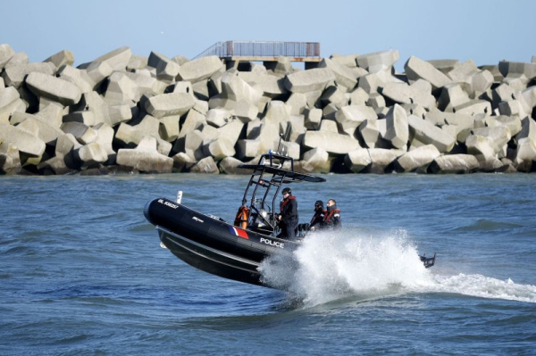 At least 12 dead as boat carrying migrants capsizes in English Channel