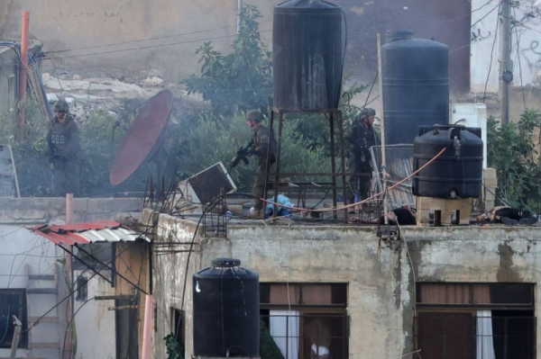 IDF investigating soldiers for throwing bodies of Palestinians from West Bank rooftop IDF investigating soldiers for throwing bodies of Palestinians from West Bank rooftop