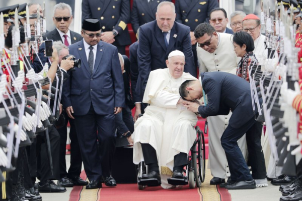 Pope arrives in Indonesia on first leg of Asia-Pacific tour to promote religious harmony