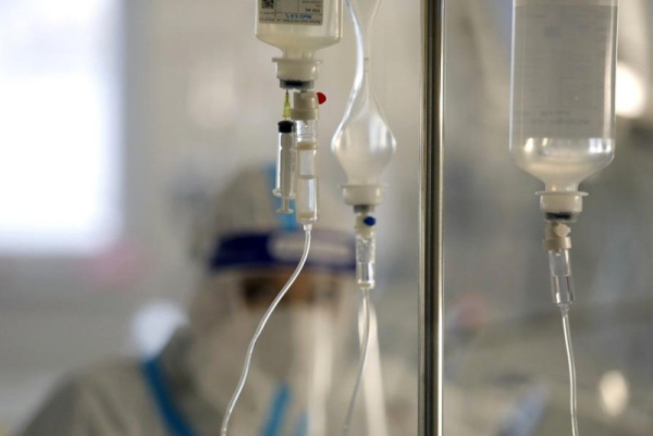 Biden invokes wartime powers to address IV fluids shortage