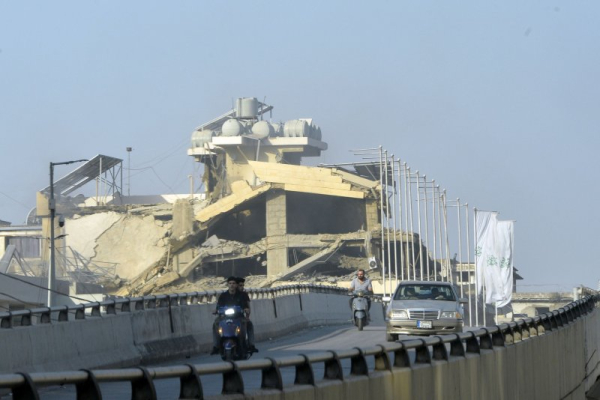 Israel resumes bombing of south Beirut suburbs, kills 2 in air raids in northeastern Lebanon