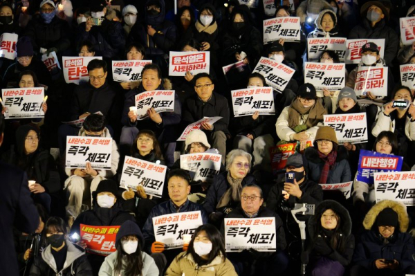 Leader of Yoon's party calls for president's suspension, citing 'great danger' to country