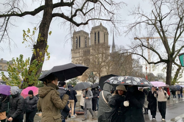 Making 'charcoal into light,' Paris' restored Notre Dame opens after devastating fire