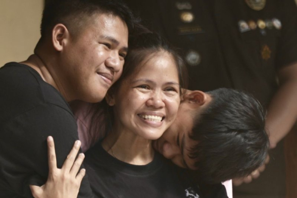 Woman returned to Philippines after 14 years on death row in Indonesia on drug charges
