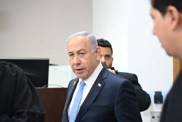 At trial, Israeli PM Netanyahu calls corruption charges 'political persecution'