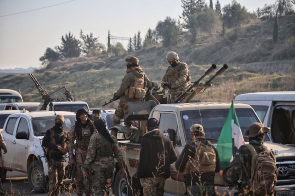 At least 70 killed in Syrian clashes between the government and pro-Assad gunmen At least 70 killed in Syrian clashes between the government and pro-Assad gunmen