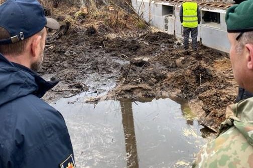 Engineers seek to extract Army vehicle submerged in Lithuanian forest, search for 4 troops