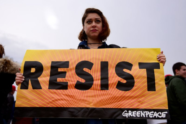 Six people arrested for dumping 'blood-red dye' in U.S. Embassy pond in London