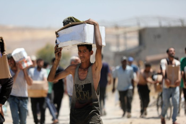 2 reported dead after 'hordes' of Gazans overwhelm aid warehouse