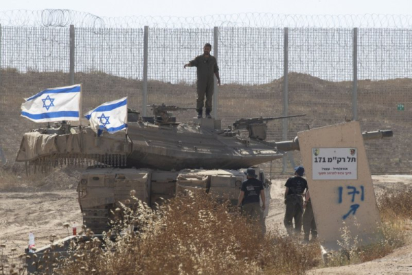 Days before Trump's trip to Middle East, Israel begins massing soldiers on border with Gaza