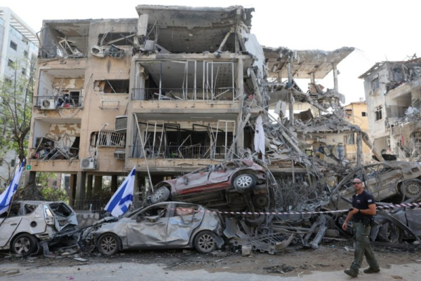 Israel, Iran resume missile exchange, threaten more attacks