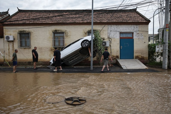 Flooding kills at least 40 in and around Beijing, many still missing