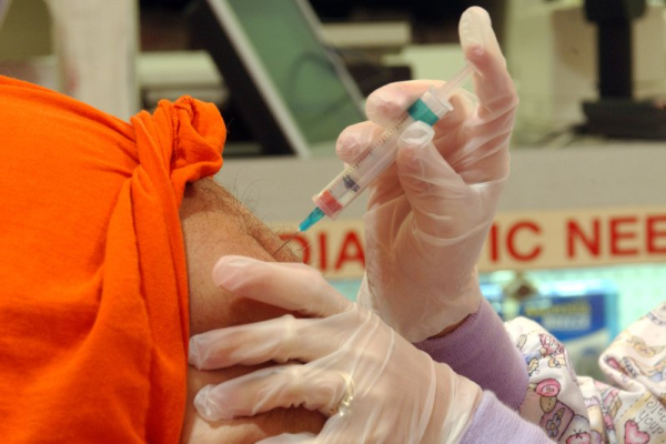 Mercury preservative to be removed from all flu shots, CDC says