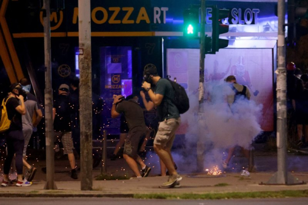 Anti-corruption protesters burn Serbian ruling party offices Anti-corruption protesters burn Serbian ruling party offices