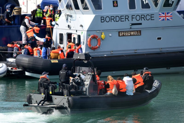 Britain begins detaining 'small boat' migrants to send back to France Britain begins detaining 'small boat' migrants to send back to France