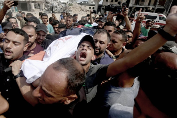 Palestinian journalists killed by Israel mourned in Gaza funeral