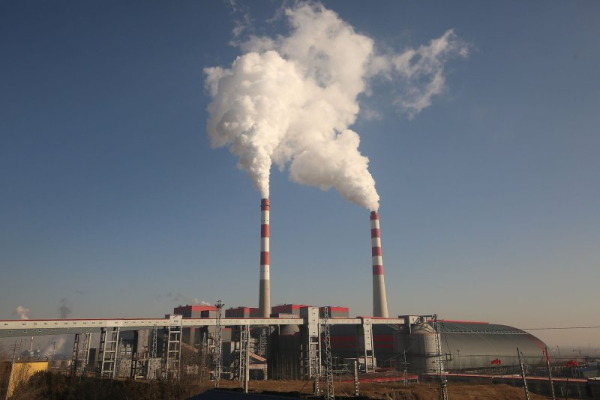 China sets target to cut greenhouse gas emissions for first time