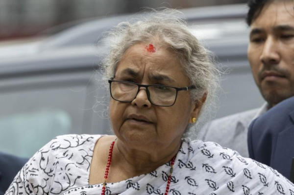 Nepal swears in new prime minister, calls March election