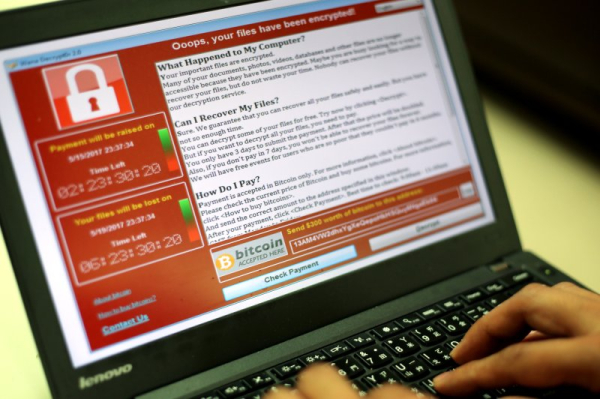 British businesses urged to keep hard copies amid rising cyberattacks