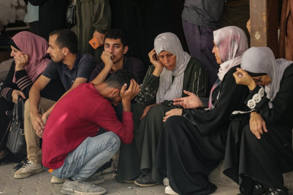 Israel fires on family crossing cease-fire line in bus, killing 11