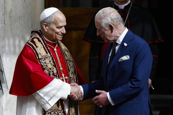 King Charles III prays with Pope Leo
