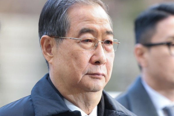 Ex-PM Han sentenced to 23 yrs in prison for playing key role in insurrection Ex-PM Han sentenced to 23 yrs in prison for playing key role in insurrection