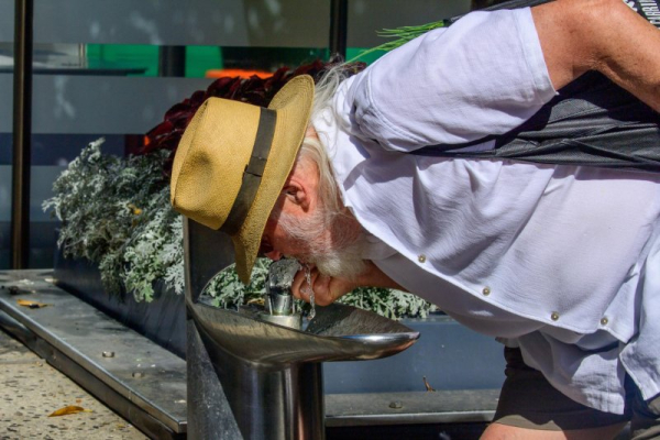 Firefighters battle out-of-control fires in Victoria amid record heat