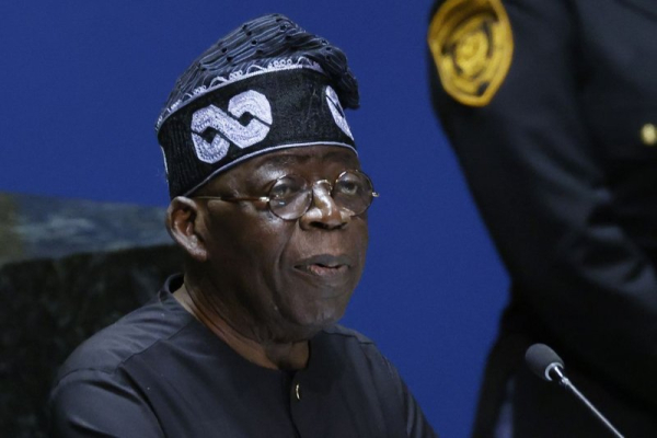 Nigerian president launches hunt for assailants who killed dozens