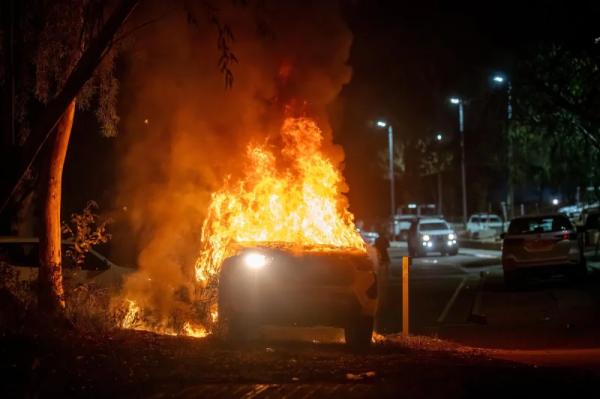 Police arrest, charge at least 19 after Alice Springs' riot