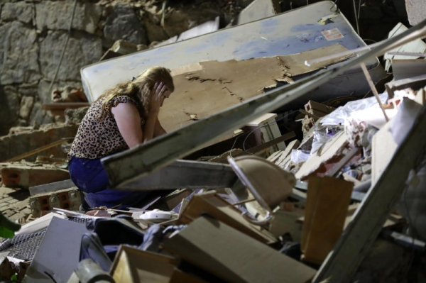 Strong earthquakes hit Venezuela's capital region, killing dozens