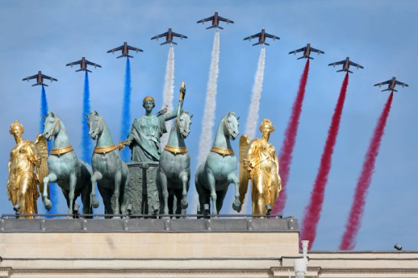France celebrates Bastille Day with allies amid wildfires